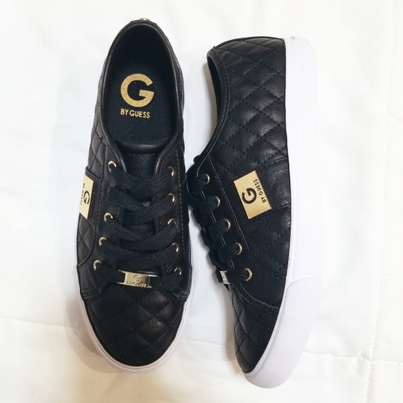 guess black and gold shoes